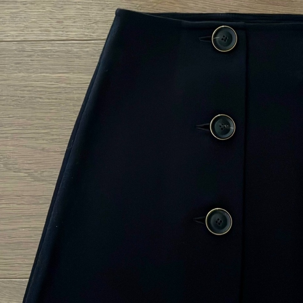 St. John A-Line Skirt, Wool+Viscose Single Pleat Three-Button Midi-Length.